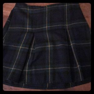 Women’s short tartan plaid pleated flannel skirt.